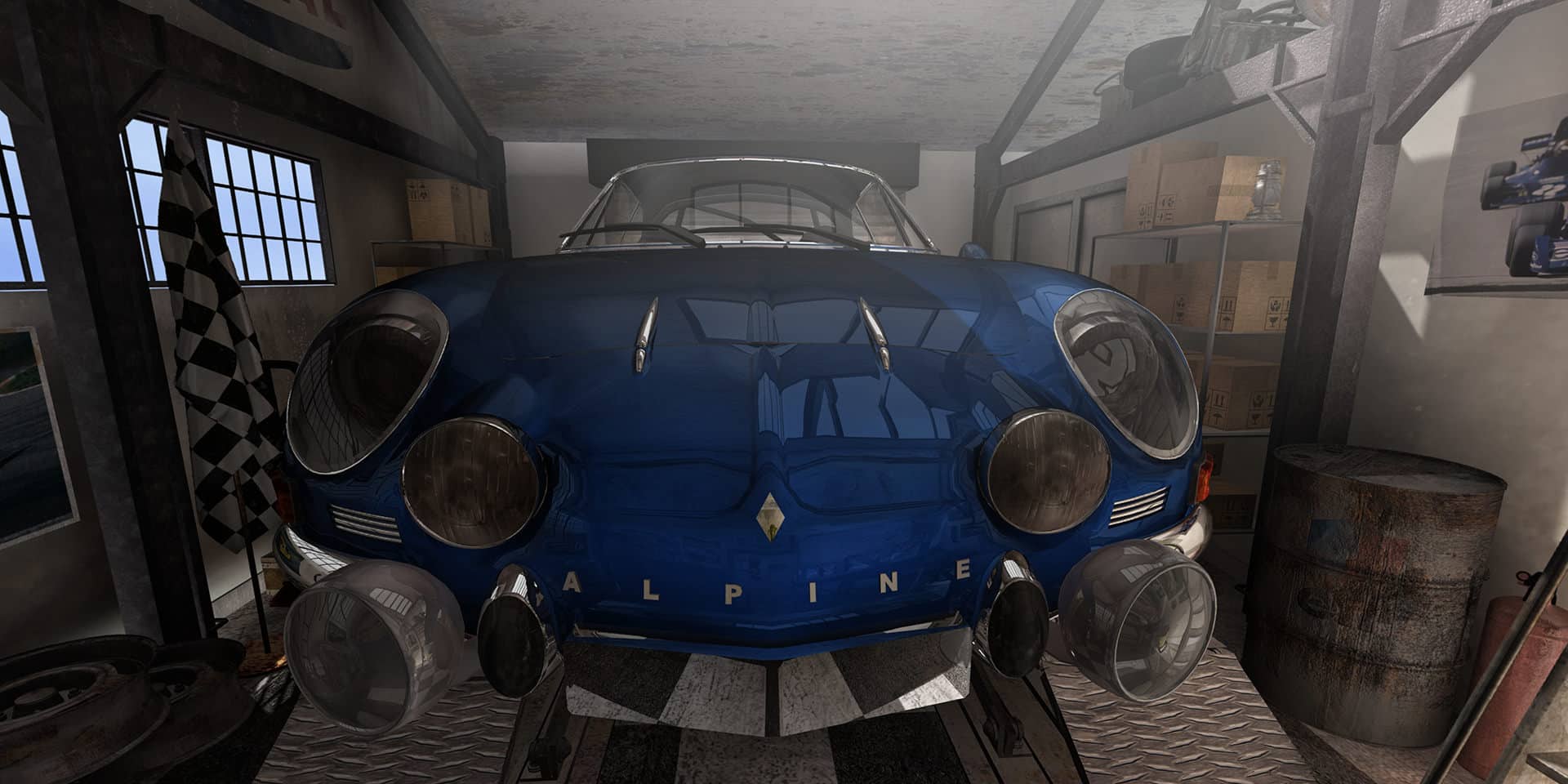 Alpine Renault classique en course, utilisée pour la promotion des huiles moteur Total